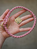 Porte-médaille tressé (30%)